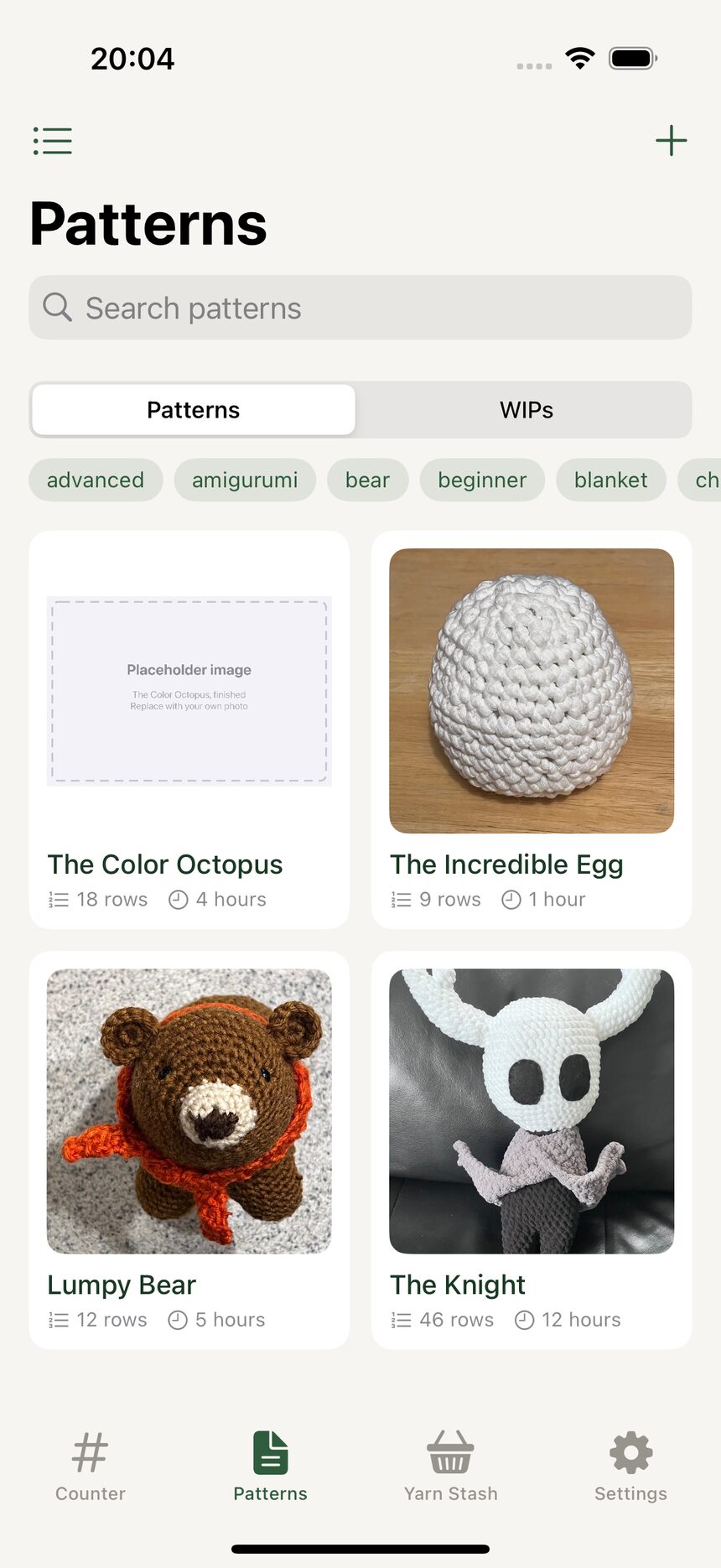 The pattern library in grid view, showing cover photos in two columns.
