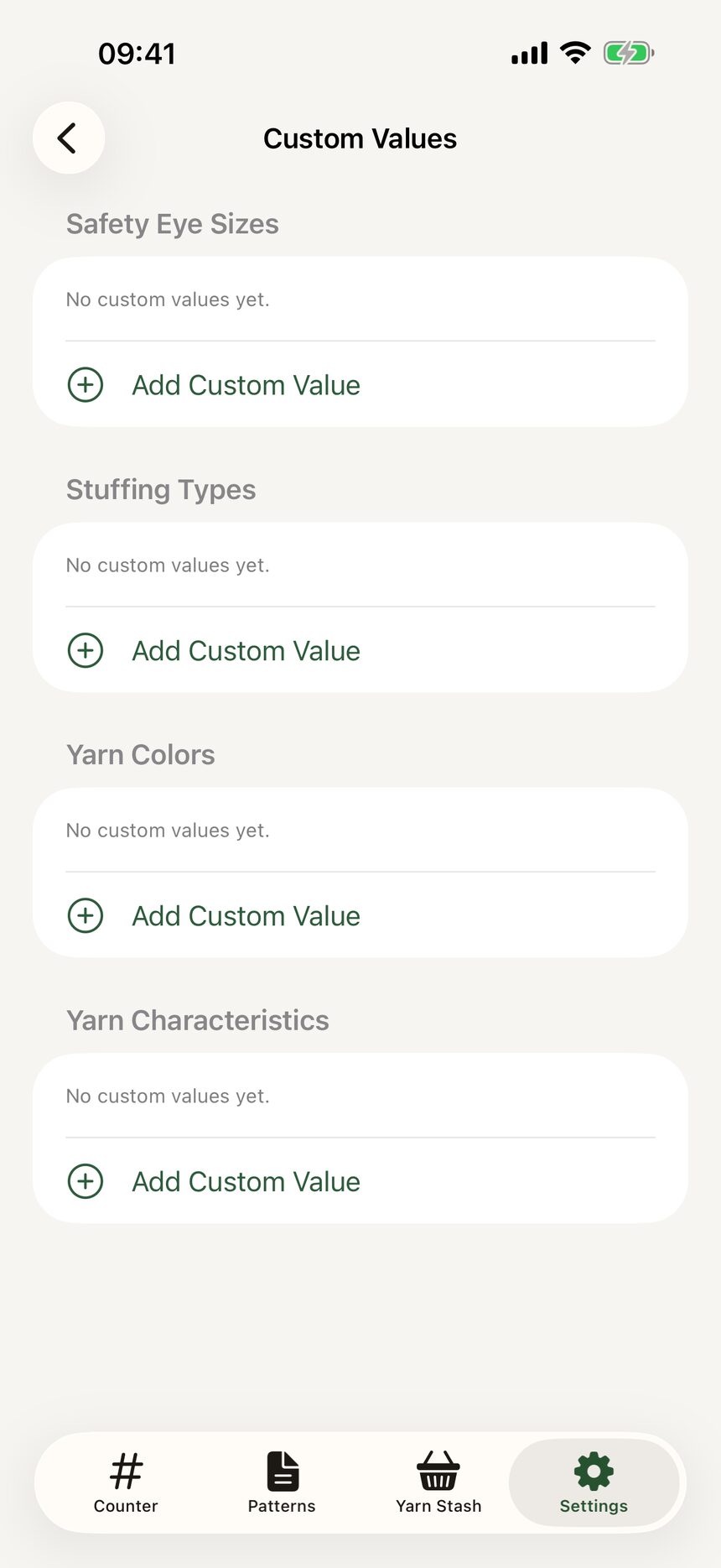 The Custom Values screen showing user-added hook sizes, weights, fibers, and currencies.